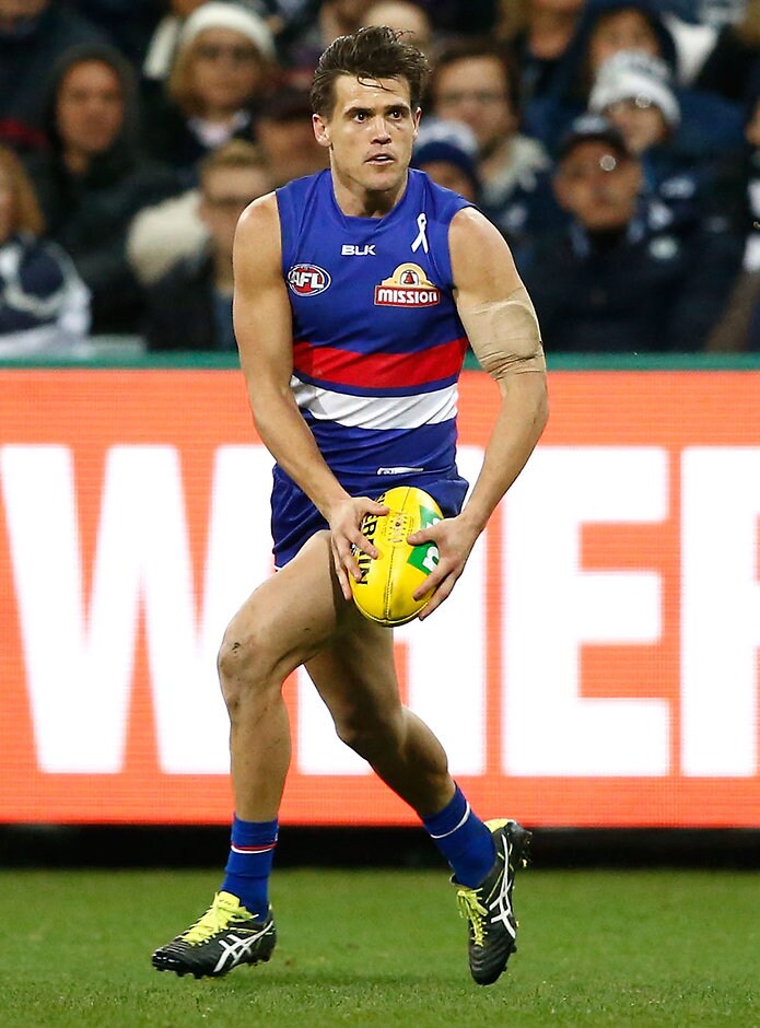 AFL 2016 Rd 19 - Geelong v Western Bulldogs GEELONG, AUSTRALIA - JULY 29: Jed Adcock of the Bulldogs in action during the 2016 AFL Round 19 match between the Geelong Cats and the Western Bulldogs at Simonds Stadium on July 29, 2016 in Geelong, Australia. (Photo by Adam Trafford/AFL Media)